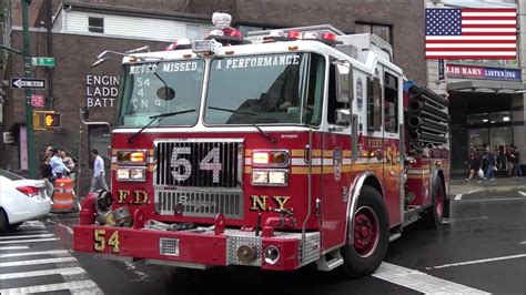 FDNY Engine 54 and Battalion 9 fire trucks responding with siren and ...