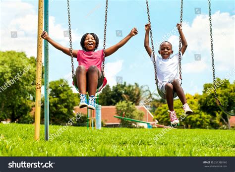 Black Kids Playing In A Park Playground: Over 5,337 Royalty-Free ...