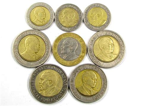 COLLECTION 8 BI METALIC COINS KENYA J 1569