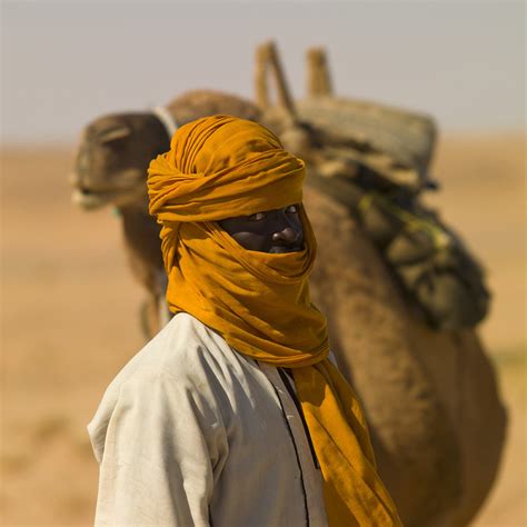 Tuareg and his camel in the desert - Libya | Tuareg people a… | Flickr