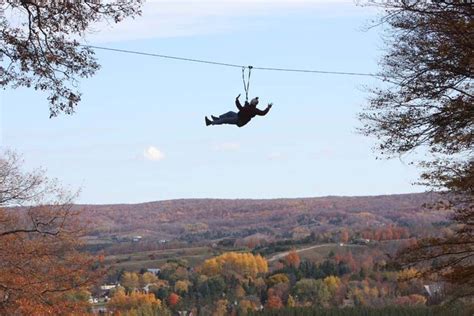 Ziplining at Boyne Mountain Resort, Boyne Falls, Michigan. I'm going to ...