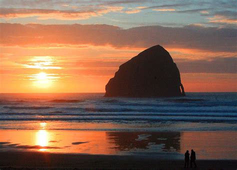 Haystack Rock At Sunset Photograph by Margaret Hood