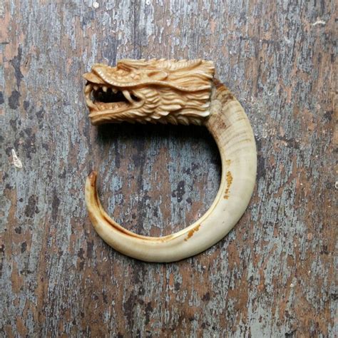 Boar tusk with "dragon head" deer antler carved By febby pamungkas ...