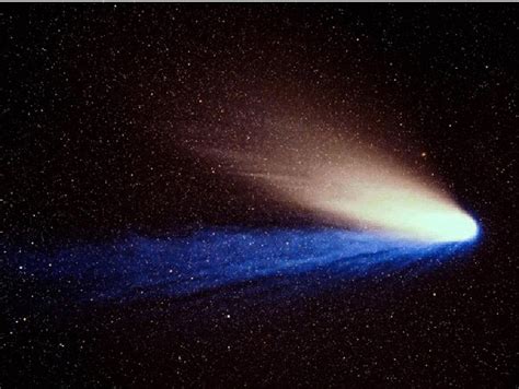 Comet Hale–Bopp (1997) showing two distinct tails—a broad dust tail ...