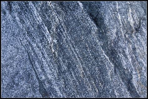 Gneiss textures | Banded gneiss rocks, closeup, at Port Stot ...