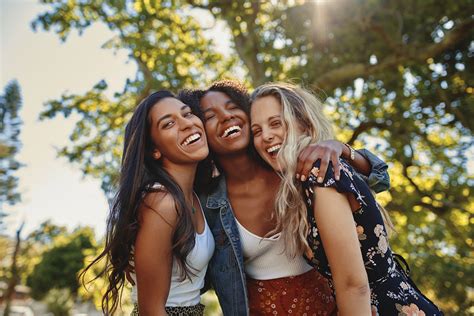 Portrait of a happy multiethnic group of smiling female friends – women ...