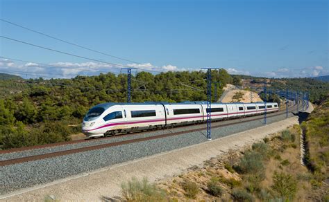 RENFE's AVE 394 Barcelona - Sevilla passes us at about 300 km/h on the ...