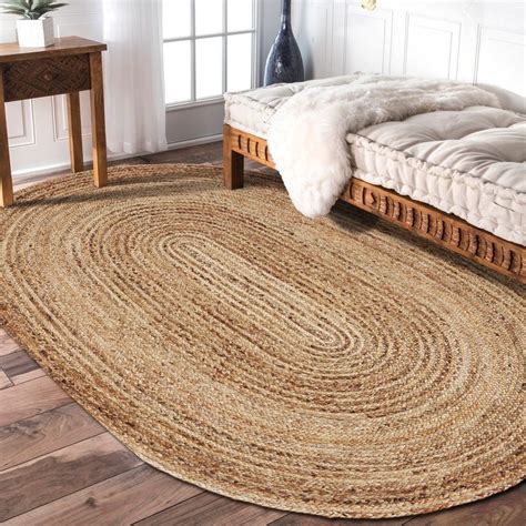 This jute rug is perfect to fit under a round dining room table or ...