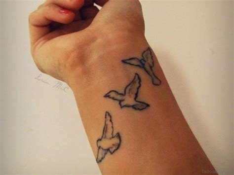 49 Creative Dove Tattoos On Wrist - Tattoo Designs – TattoosBag.com