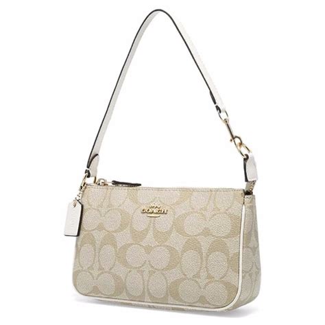 Coach Nolita 19 in Signature Canvas, Women's Fashion, Bags & Wallets ...