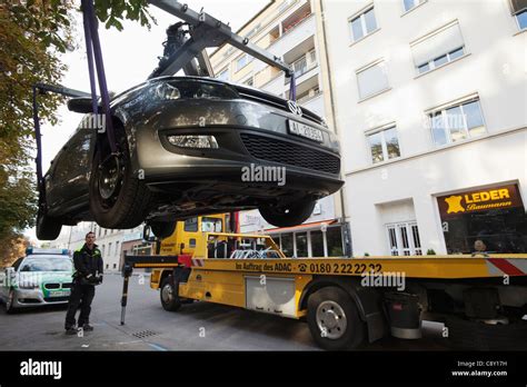 Car being towed away hi-res stock photography and images - Alamy