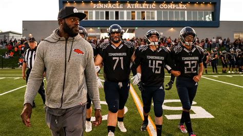 Photos: Broncos, Pinnacle Charter School unveil new synthetic turf ...