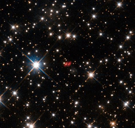 This image from the NASA/ESA Hubble Space Telescope shows the distant ...