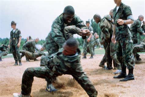 Recruits practice hand-to-hand combat techniques during basic training ...