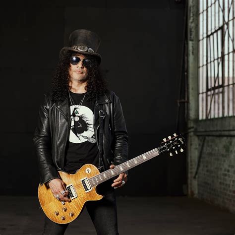 Why does Slash From Guns N’ Roses always wear a top hat? - MNPR Magazine