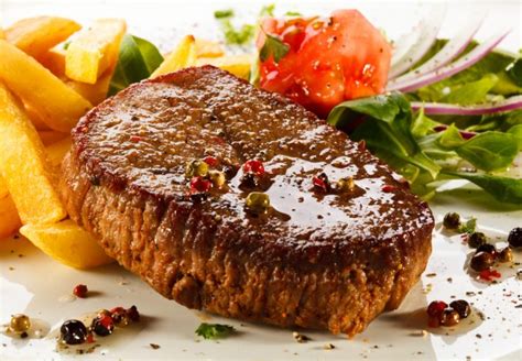 Steak with chips and leafy green salad - AI Weight Loss Diet