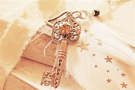 Charm Secrets: The Meaning of the Key Symbol