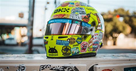 Norris unveils sticker helmet for 100th F1 race | RacingNews365