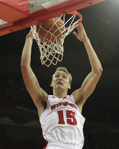 Wisconsin holds off late charge by Marquette for rivalry win, 70-64 ...