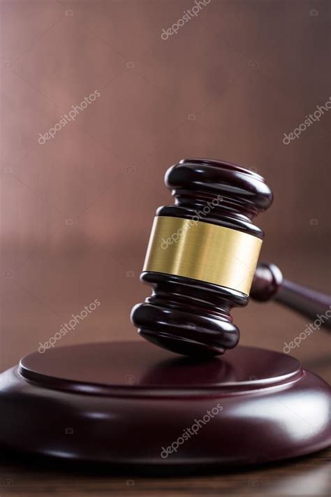 Judge gavel on wooden table — Stock Photo © jirkaejc #103340870