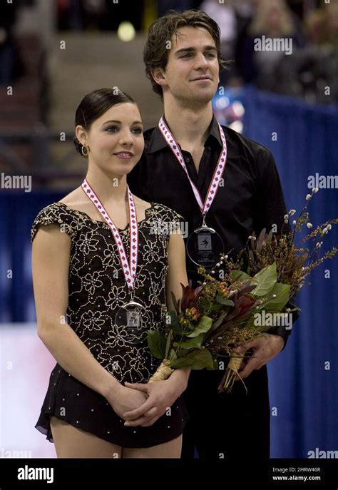 Canada's Jessica Dube and Bryce Davison stand on the podium after ...