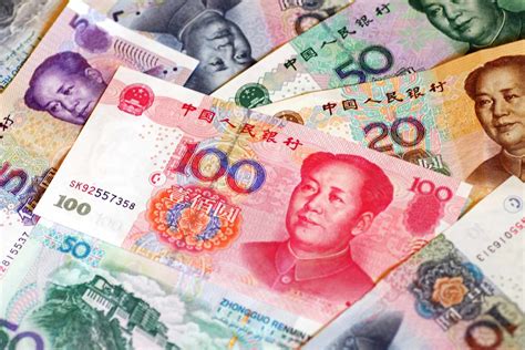 Convertir des dollars américains en yuan chinois lors d'un voyage en ...