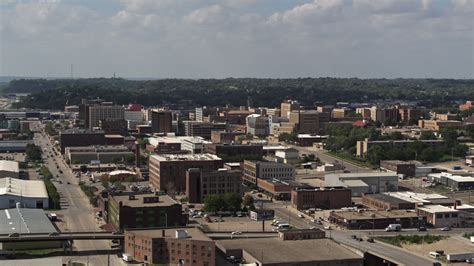 5.7K stock footage aerial video flying by the downtown area of the city ...