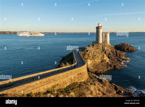 France, Finistere, the lighthouse of the Petit Minou at sunset and the ...