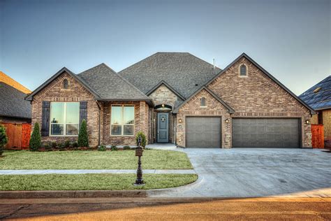 Three-Car Garage Brick Home - Traditional - Exterior - Oklahoma City ...