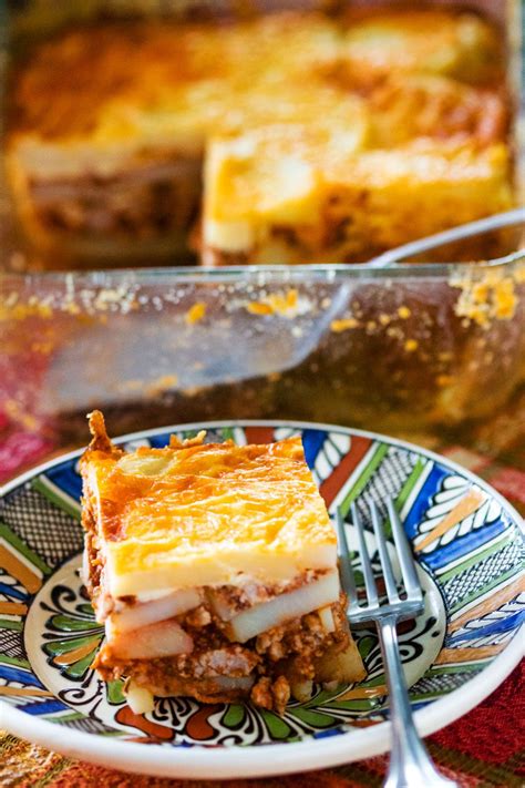 The Romanian Authentic Potato Moussaka is made with layers of potatoes ...