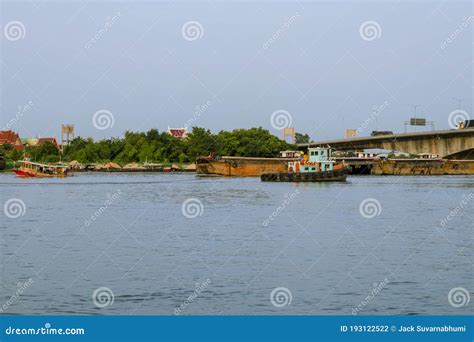 Views of the Chao Phraya River with Boats and Bridges in the Background ...