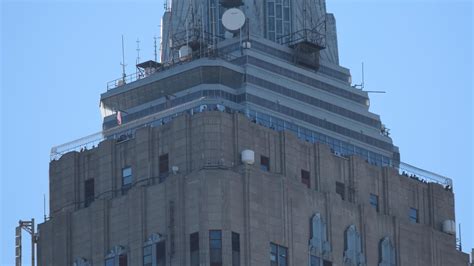 The Empire State Building observation deck, from a Park Avenue rooftop ...