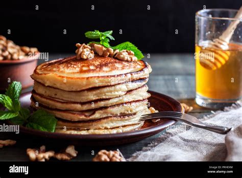 pancakes with honey and nuts Stock Photo - Alamy