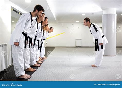 Skilled Martial Artists Preparing To Begin Training Stock Photo - Image ...