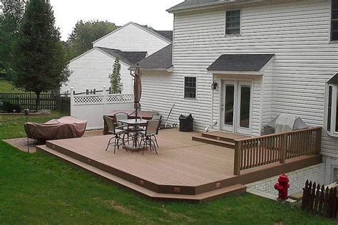 Ground level composite deck | Patio deck designs, Backyard patio, Decks ...