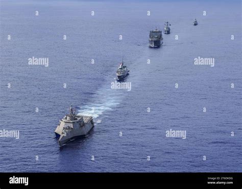 USS Gabrielle Giffords (LCS 10) leads a formation followed by the ...