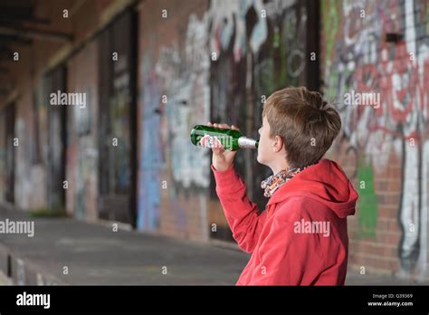 young person drinking beer Stock Photo - Alamy