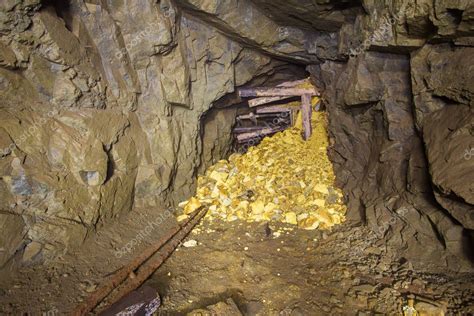 Old abandoned underground gold mine tunnel — Stock Photo © mishainik ...