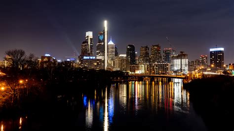 Philly Skyline Shines Blue for COVID-19 Anniversary - Visit Philadelphia