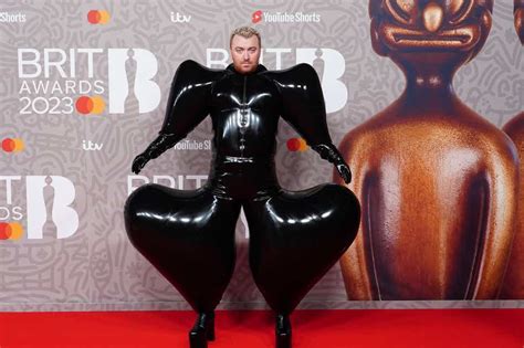 Sam Smith dons latex bodysuit for Brits red carpet dominated by black ...