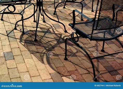 Outdoor Furniture on a Brick Patio Stock Photo - Image of patio ...