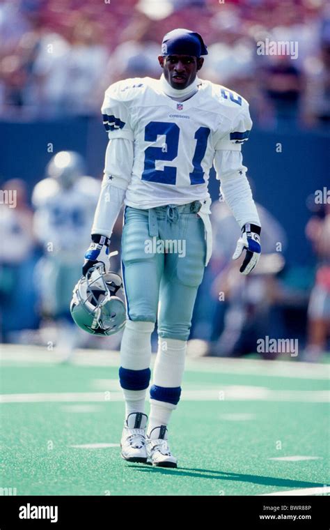 Deion Sanders competing for the Dallas Cowboys in a game against the ...