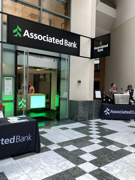 Associated Bank opens branch downtown in Milwaukee’s River Center ...