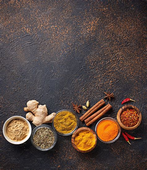 Traditional indian spices on rusty background containing paprika ...