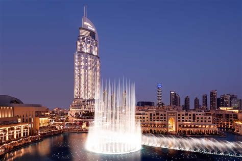 Abu Dhabi's ADNH signs $440m loan to fund Emaar hotels deal - Arabian ...