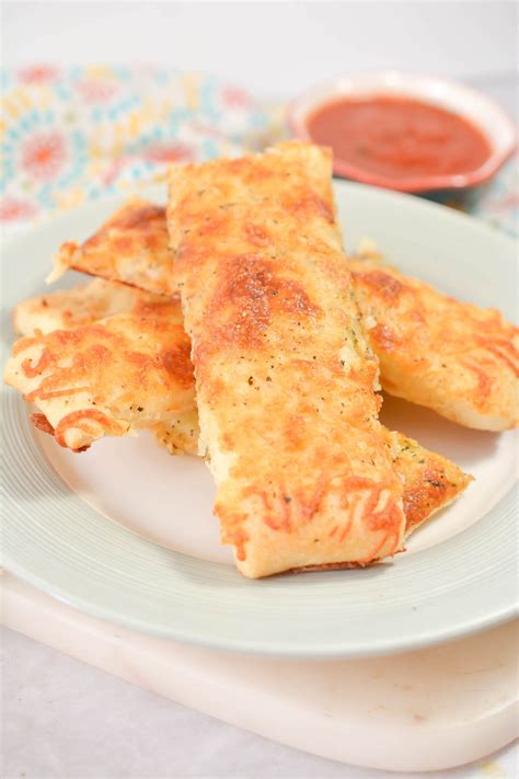 Homemade Cheesy Garlic Breadsticks - CheekyKitchen