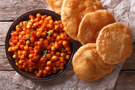 Delicious Indian Chana masala and puri close-up. Horizontal – Spice ...