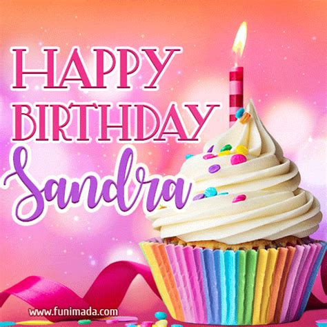 A GIF featuring the name Sandra, a decorated cupcake with a lit candle ...