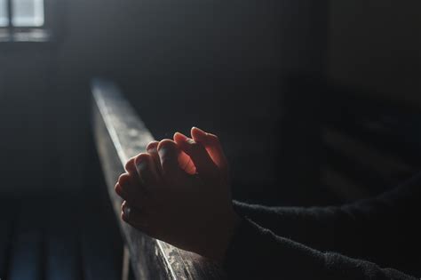 Hands Praying in Church Royalty-Free Stock Photo