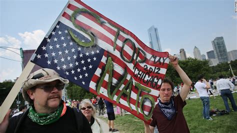 Police, protesters clash outside NATO summit - CNN